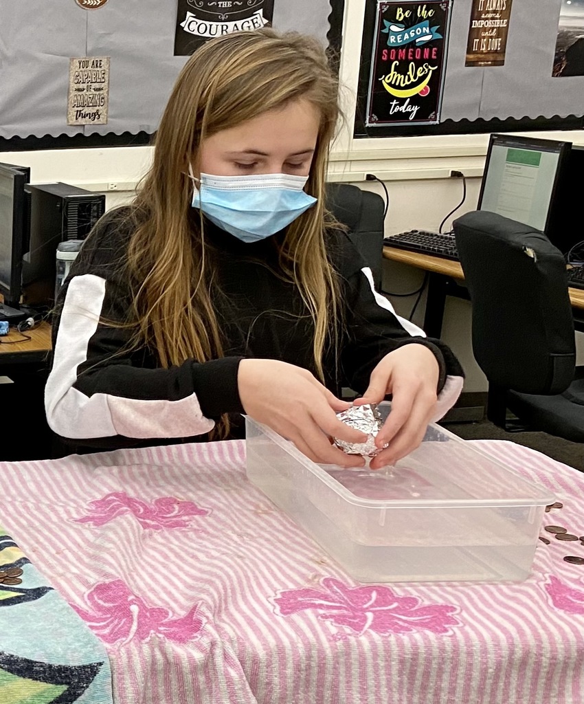 OMS students investigating the problem solving process! During this inquiry, they planned and designed aluminum boats which transport pennies.