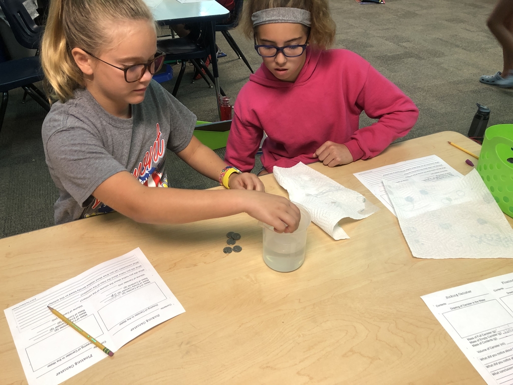 5th graders investigating mass, density and volume. 