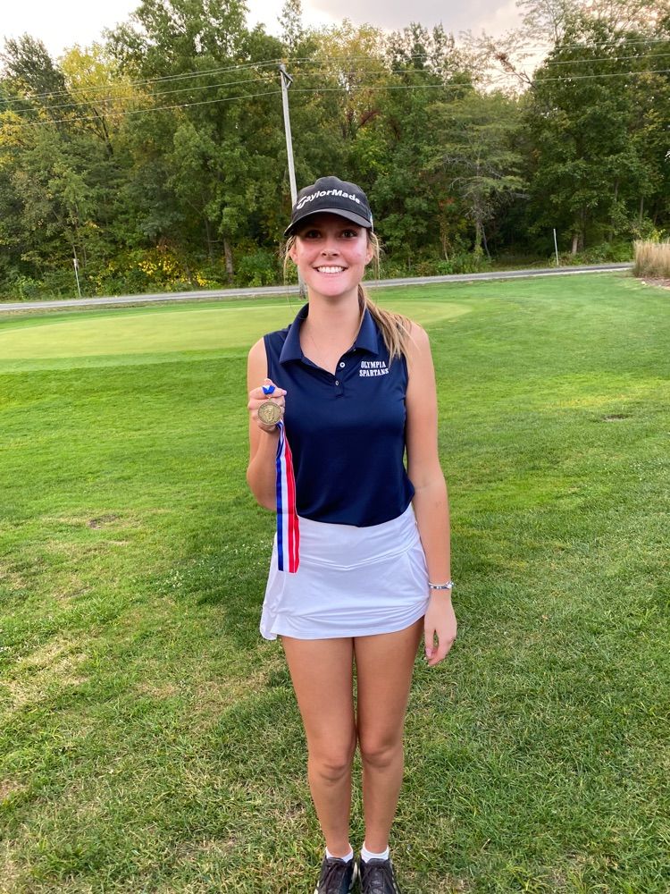 Golf girl with medal